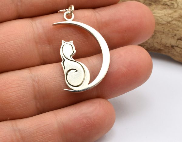 cat and moon pendant