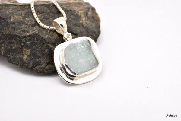 Raw aquamarine pendant in sterling silver