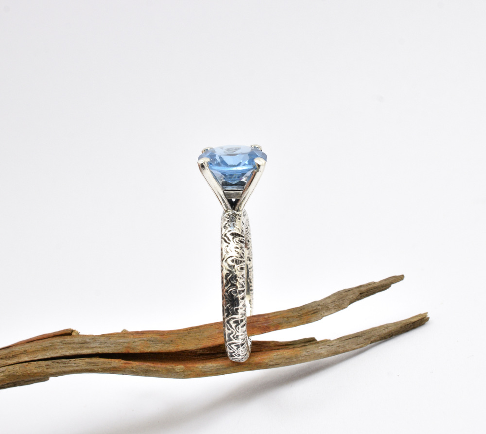 Statement blue topaz ring in sterling silver