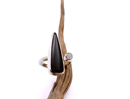 one-of-a-kind statement ring. Expertly handmade with moonstone and triangle black onyx