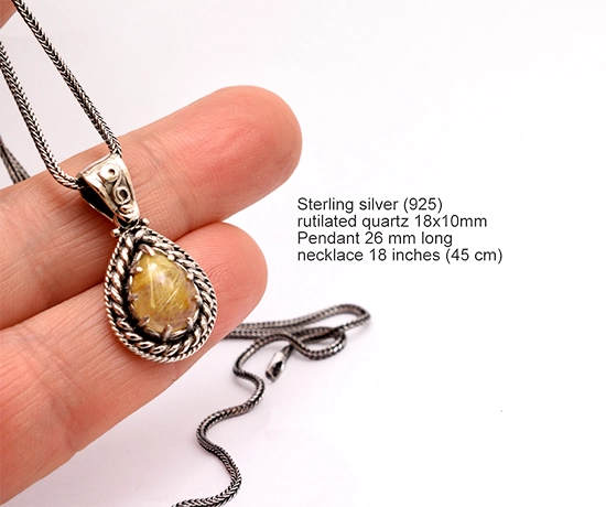 ρουτίλιο κουαρτζ σε σχήμα δάκρυ με ωραίους εγκλεισμούς και ρετρό διακόσμηση