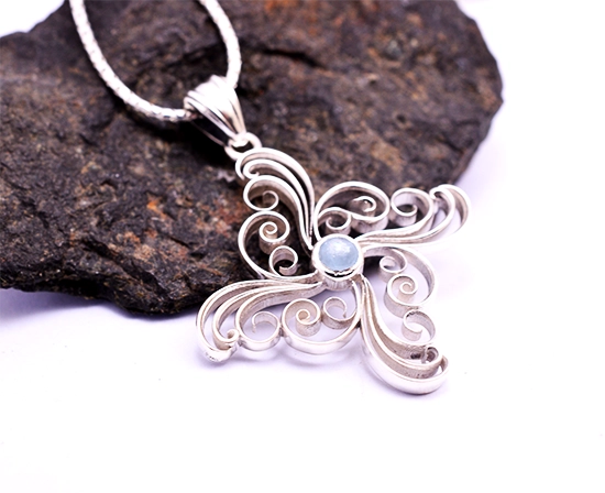 Handcrafted sterling silver pendant with aquamarine stone. Pinwheel, cross filigree design. Unique artisan jewelry. Free shipping available. Aquamarine Silver Pinwheel cross Pendant | Handmade Filigree